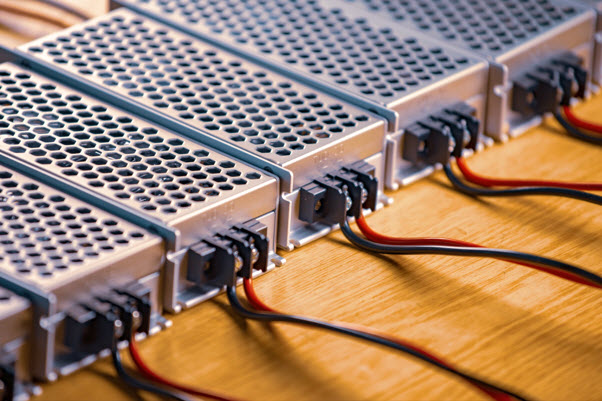 Group of Metal Boxes with Wires from Uninterruptible Power Supplies Group of Metal Boxes with Wires from Uninterruptible Power Supplies