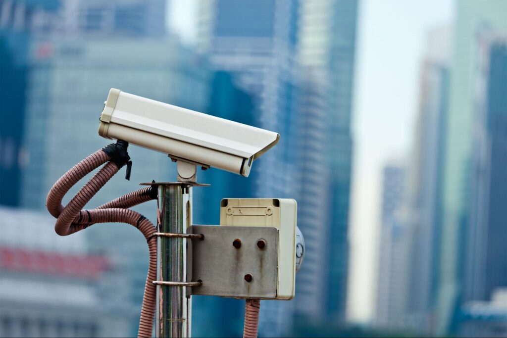 CCTV surveillance camera mounted at a building entry point in Singapore
