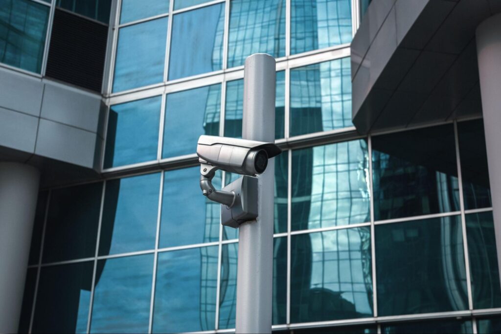 External IP surveillance camera on a commercial building facade in Singapore