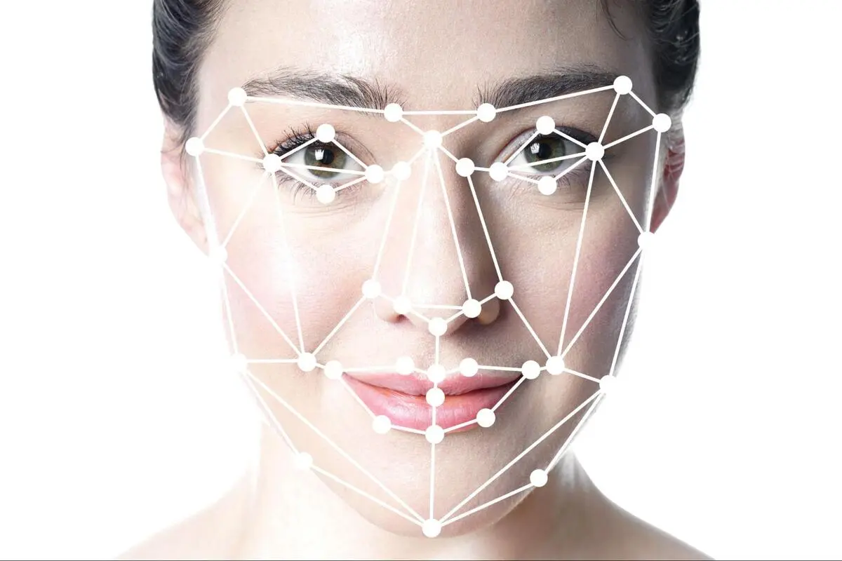 Facial Recognition Mapping for Biometric Door Lock Systems Woman's face with geometric facial recognition mapping points showing how biometric door lock systems identify users