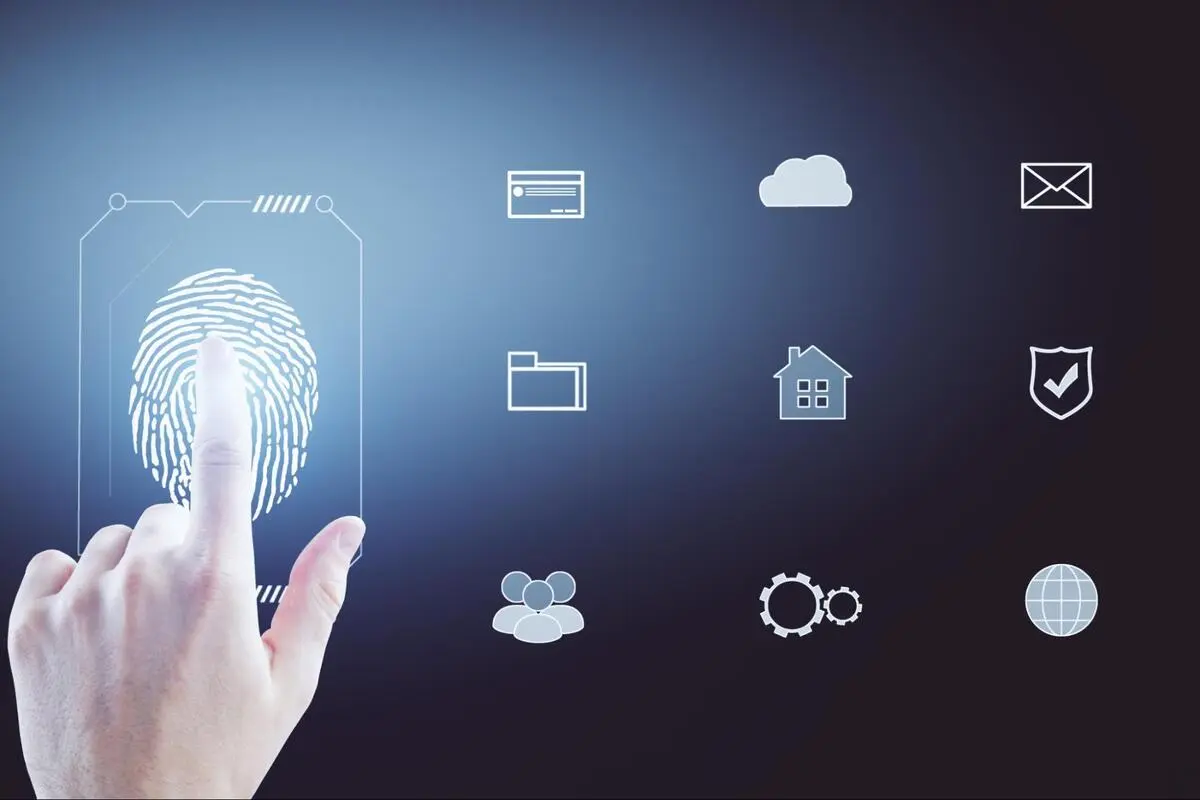 Biometric authentication on a cloud-connected system Fingerprint scanned on a touchscreen surrounded by digital icons for cloud storage, files, users and security